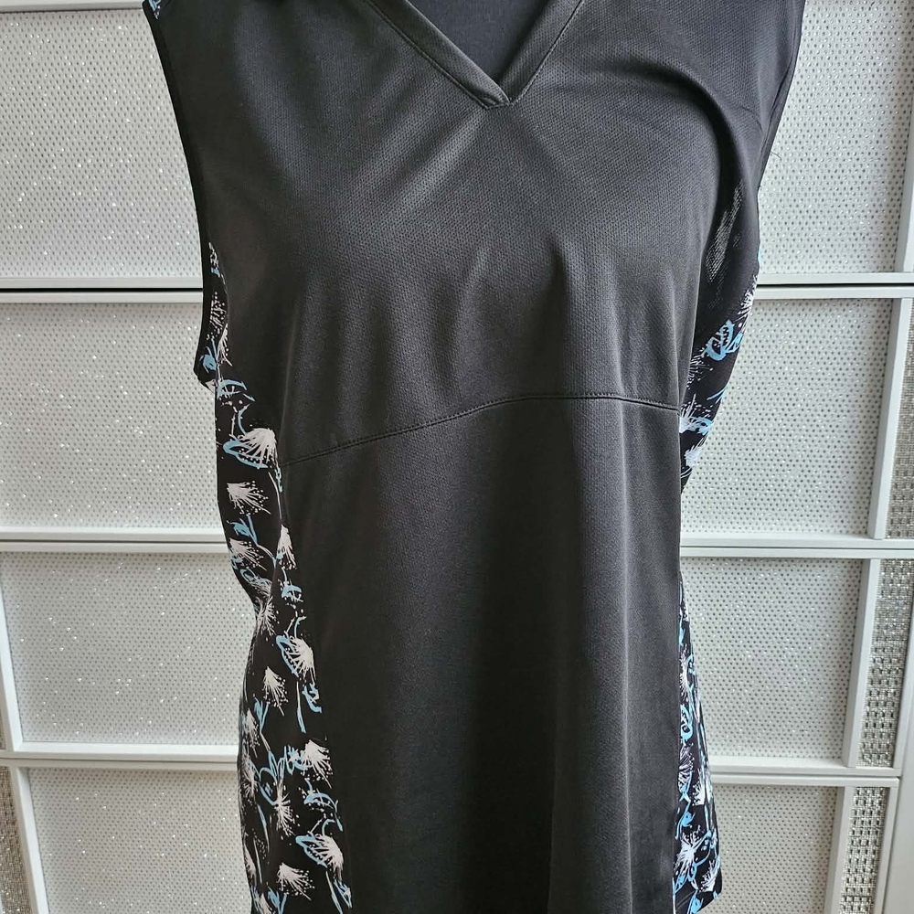 Black Sleeveless Top with Blue and White Floral Accents